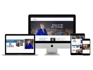 A website for a woman with a laptop, tablet, and phone who is a Branding expert for entrepreneurs and authors.