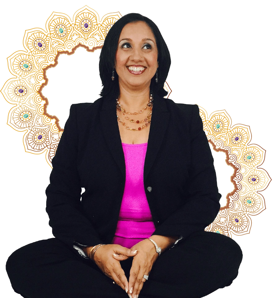 A woman in a business suit sitting in a lotus position, harnessing her expertise as a high achievement coach and abundance manifestation expert.