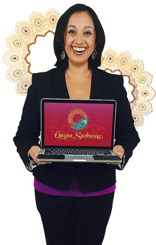 A woman, Gagan Sarkaria, holding a laptop with the word Chinese astrology on it. A woman, Gagan Sarkaria, holding a laptop with the word Chinese astrology on it.