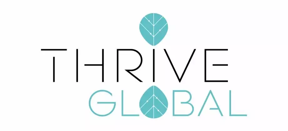 Thrive global logo on a white background.