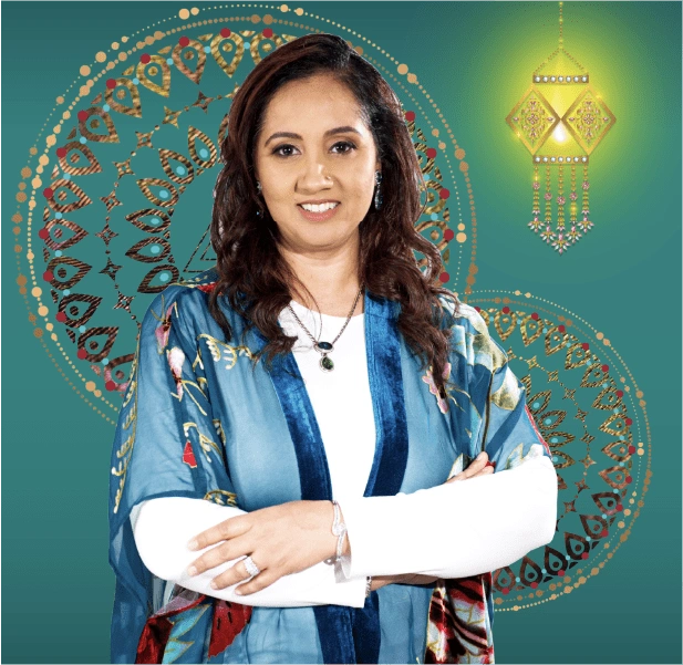 A woman in a blue shawl standing in front of a green lantern, guided by Gagan Sarkaria, a high achievement coach and abundance manifestation expert. A woman in a blue shawl standing in front of a green lantern, guided by Gagan Sarkaria, a high achievement coach and abundance manifestation expert.