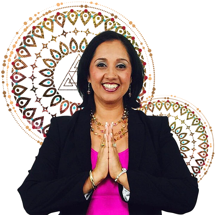 A woman with her hands folded in front of a circular pattern, representing the soul's journey to discover its unique SoulCode.